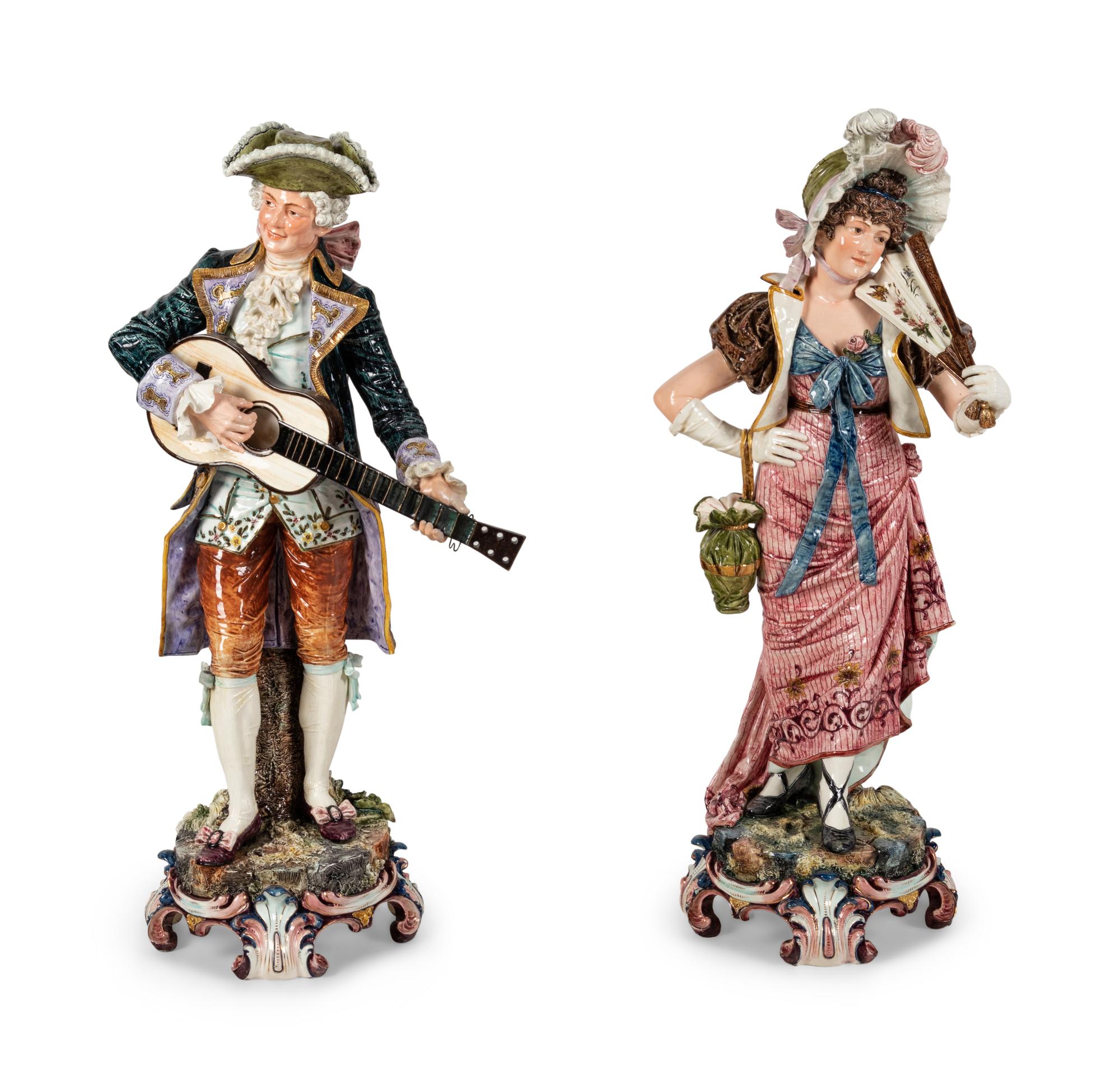 A Pair of Large Continental Glazed Pottery Figures