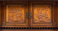 A Continental Carved Walnut and Burlwood Serving Cabinet