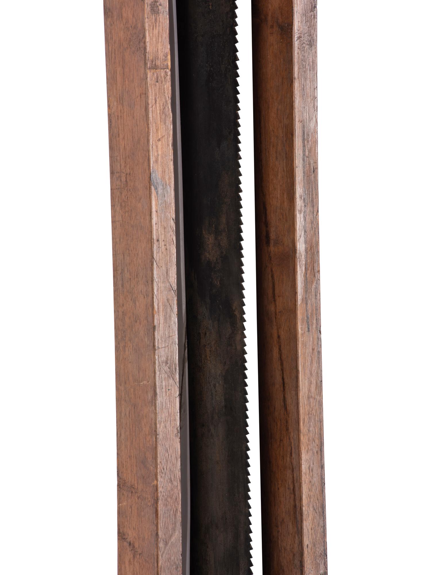 Four Wrought and Cut Iron and Wood Farm Saws