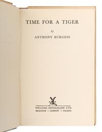 BURGESS, Anthony (1917-1993). Time for a Tiger . Melbourne, London & Toronto: William Heinemann Ltd, 1956.