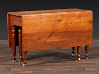 A Late Federal Cherrywood Drop-Leaf Dining Table (Please send consignor donation receipt once donated)
