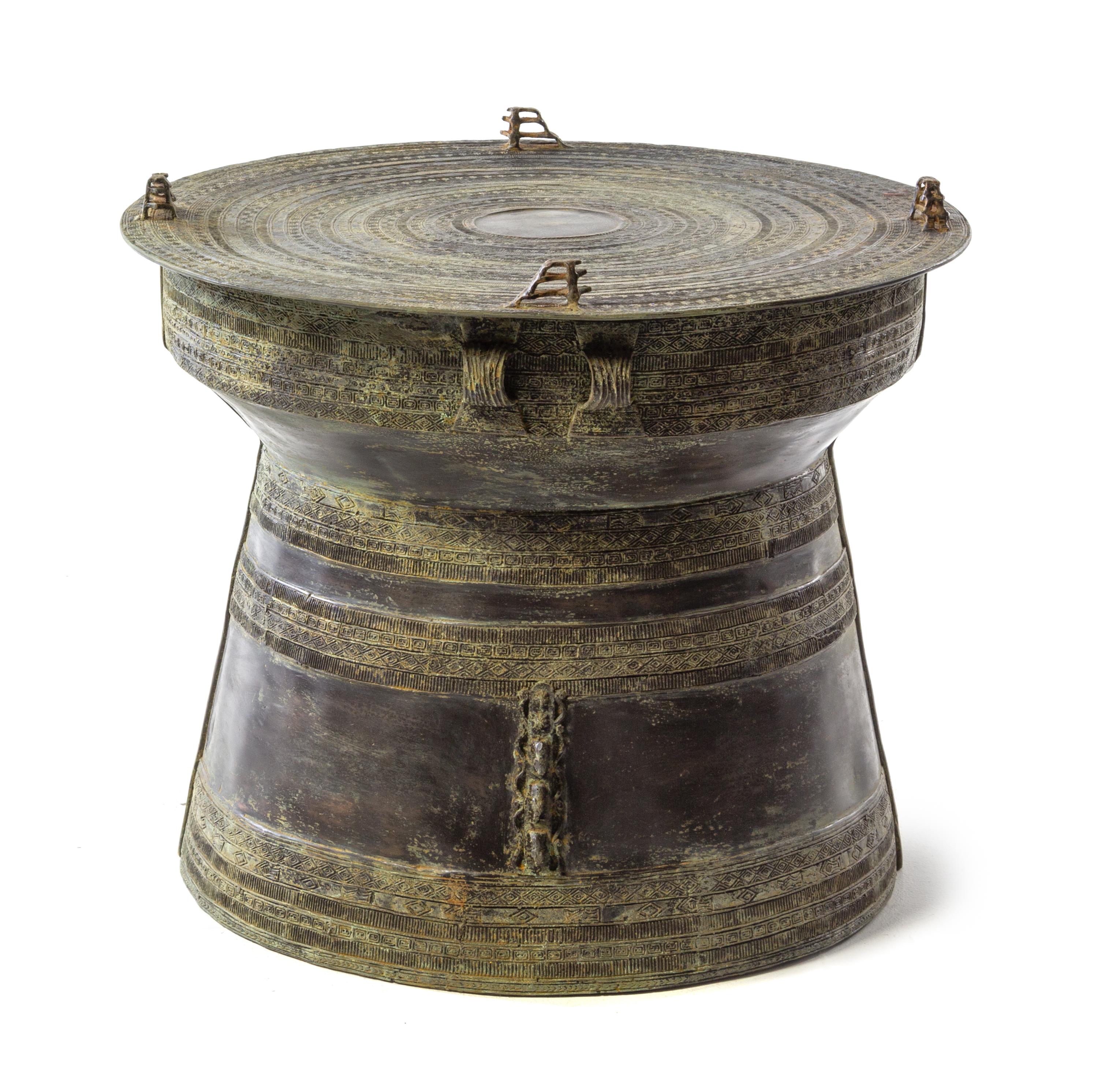 A Southeast Asian Bronze Rain Drum Height 20 1/2 x diameter 24 1/4 inches. — 20TH CENTURY