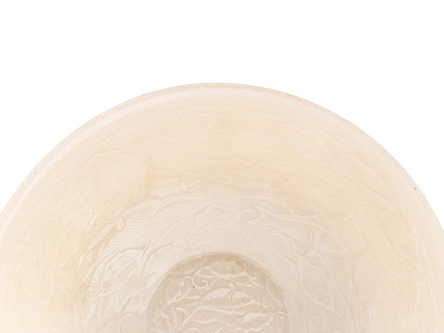 A Japanese White Glazed Molded Bowl