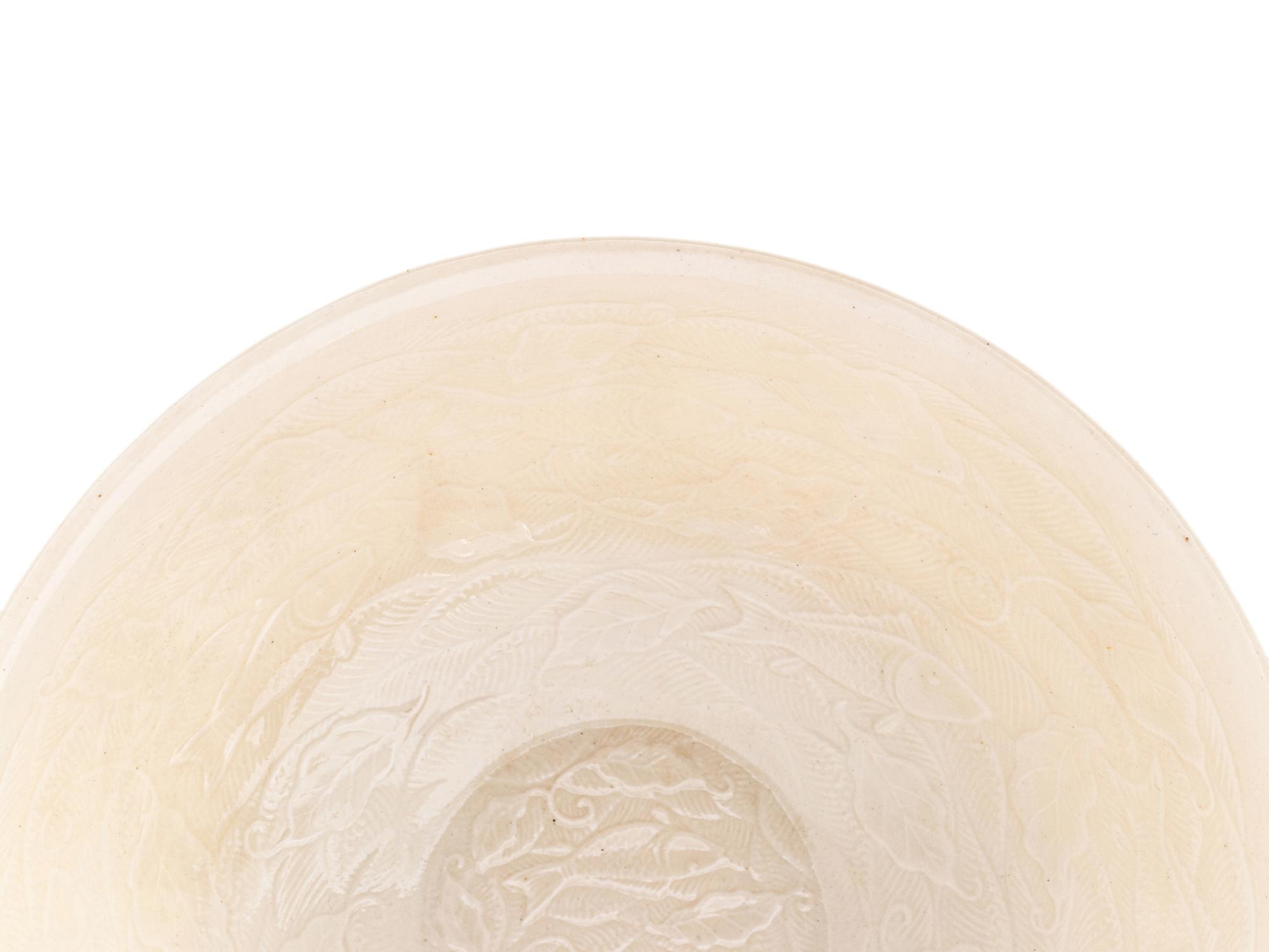 A Japanese White Glazed Molded Bowl