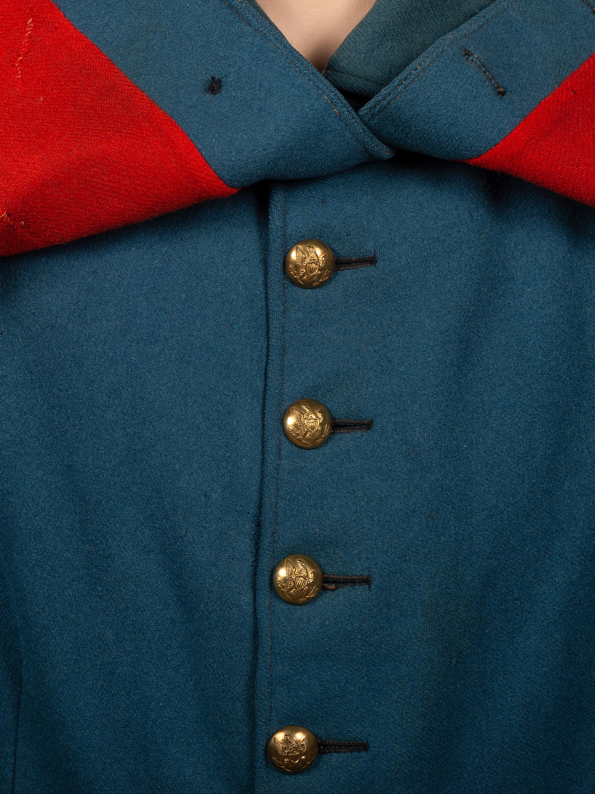 [MILITARIA]. Civil War-era enlisted overcoat with modifications.