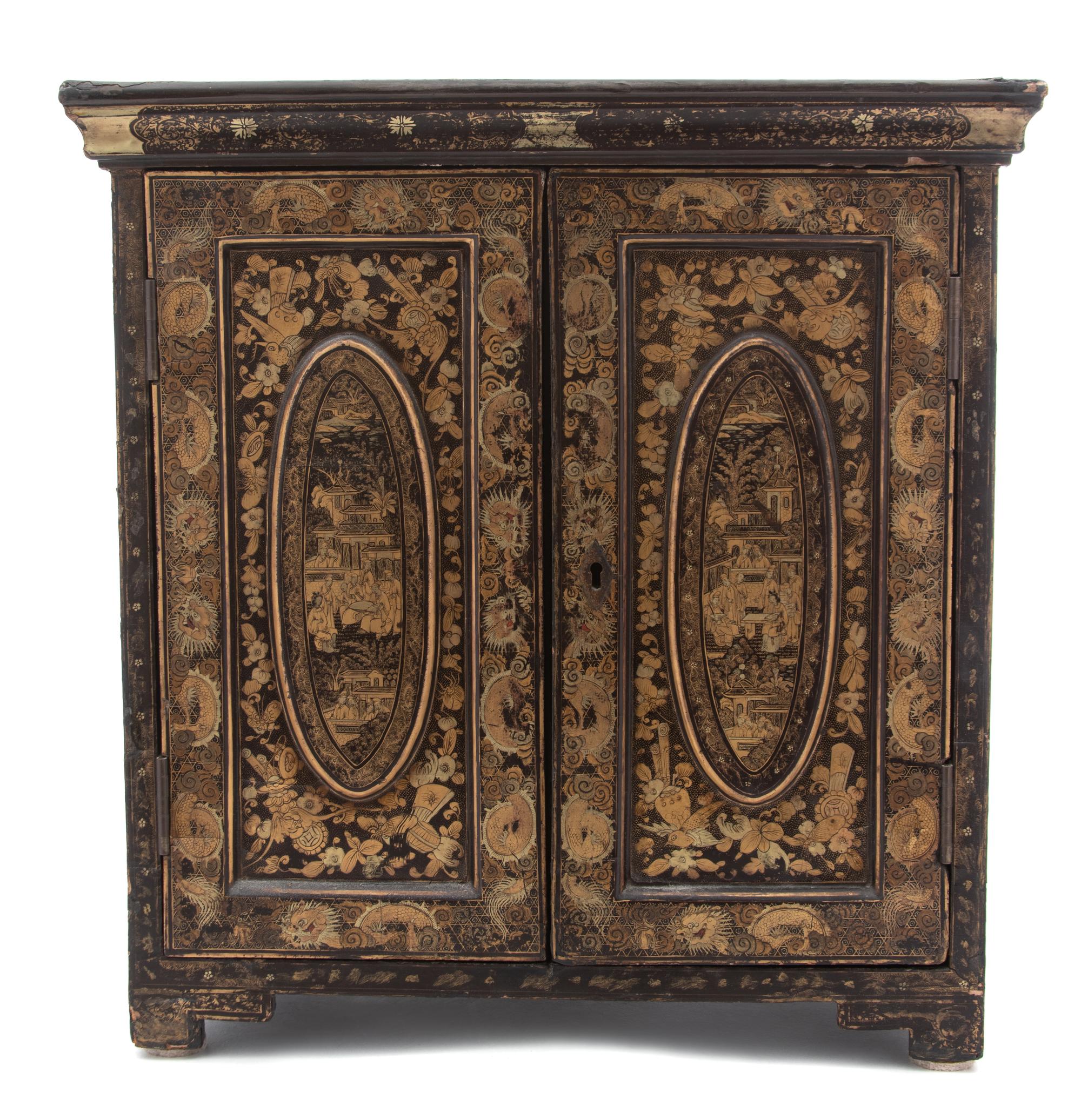 A Chinese Export Black and Gilt Lacquer Chinoiserie Decorated Specimen Cabinet Height 15 x width 14 1/2 x depth 8 1/2 inches. — 19TH CENTURY