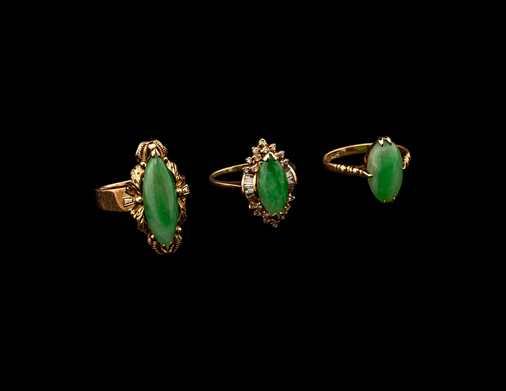 Three Chinese Apple Green Inset Gold Mounted Rings