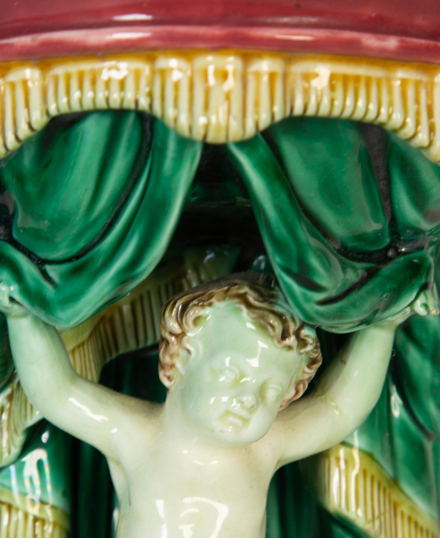 Two Majolica Putti Wall Brackets — 19th Century