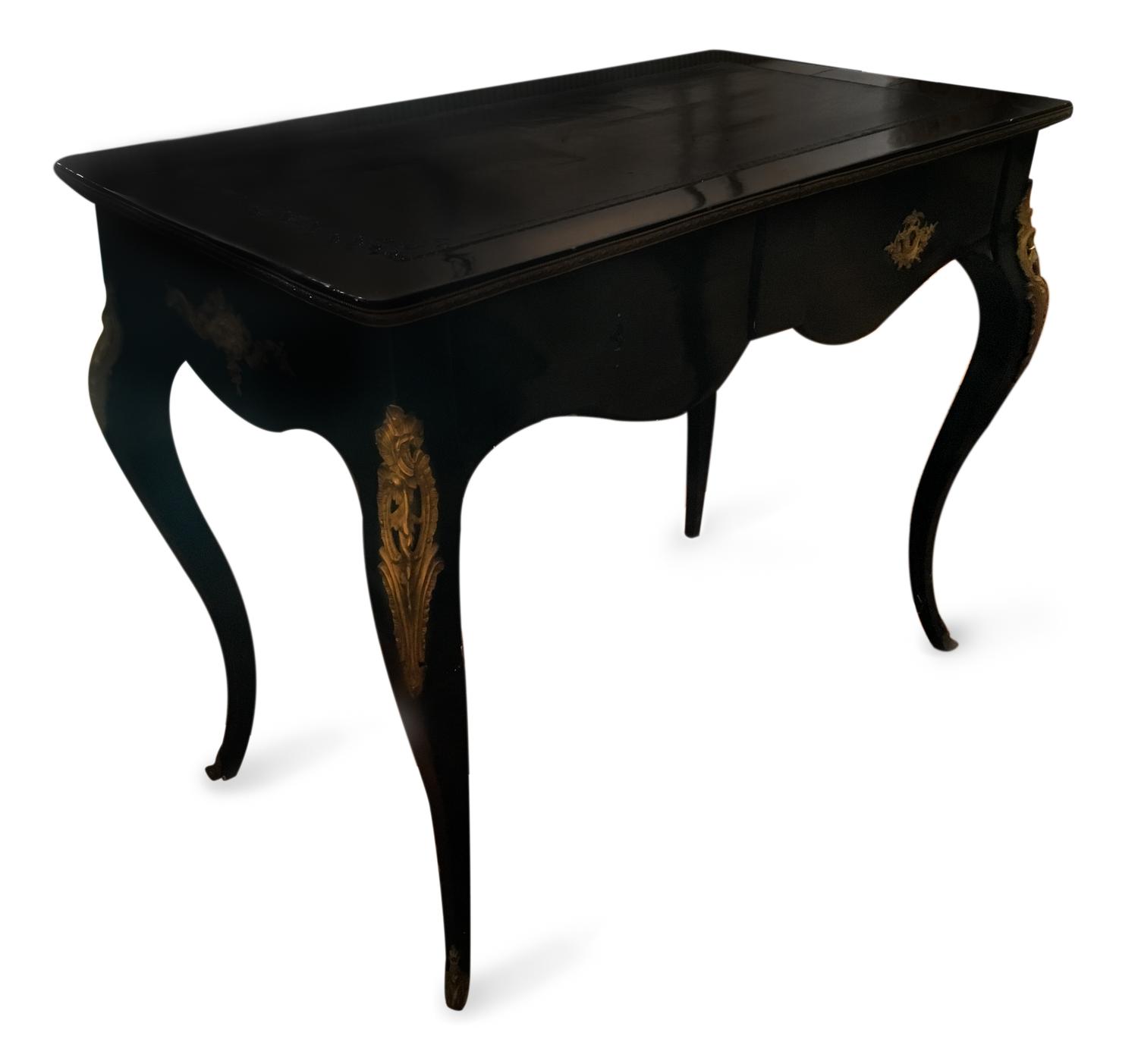 A Louis XV Style Ebonized and Gilt Metal Mounted Bureau Plat Height 29 x width 35 3/4 x depth 21 inches. — 19TH CENTURY