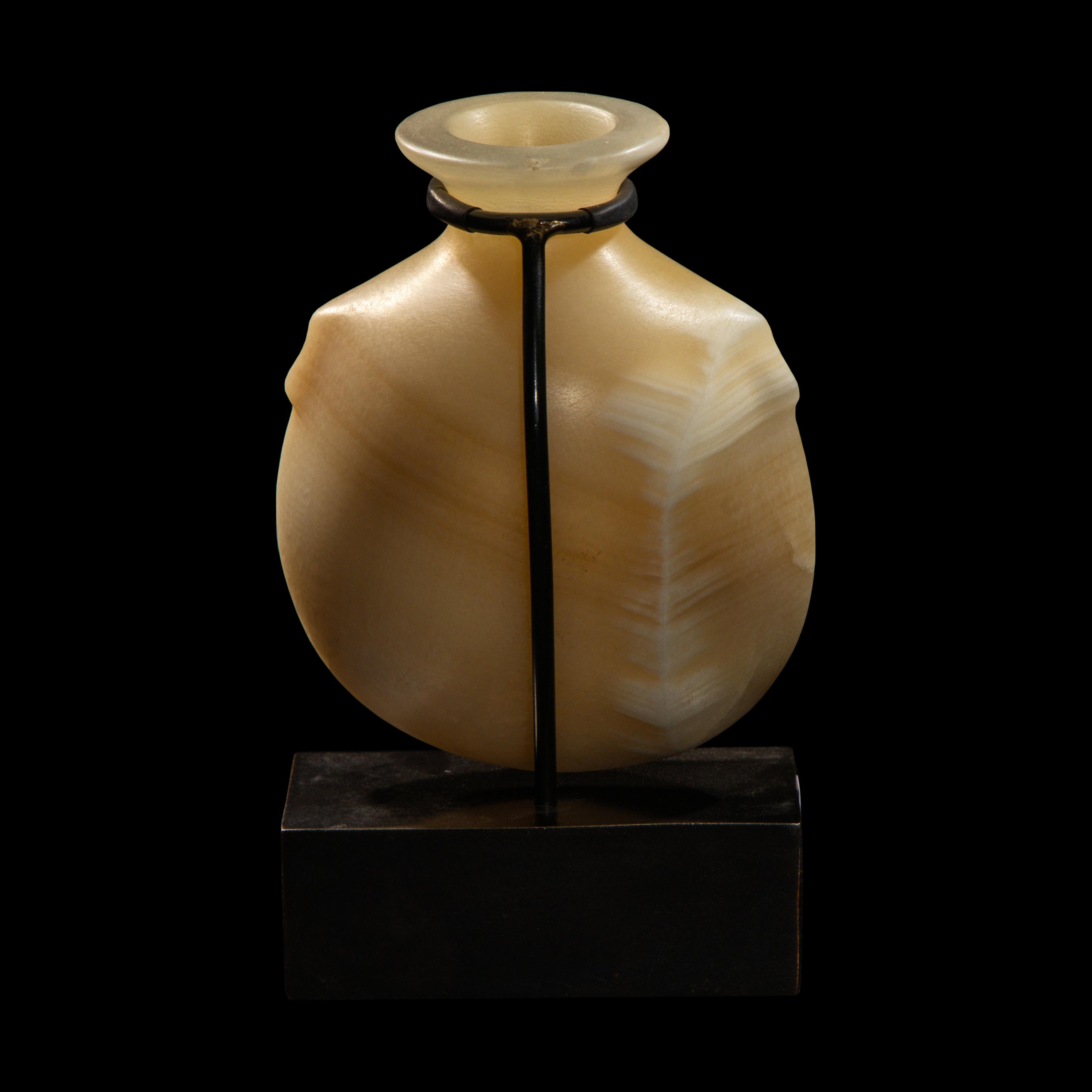 An Egyptian Alabaster Pilgrim Flask