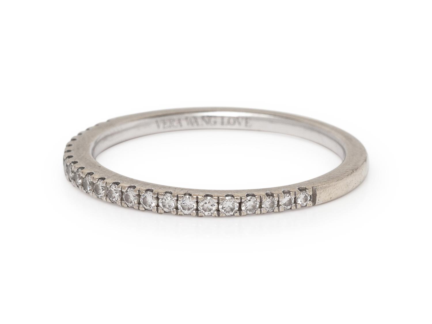 A 14 Karat White Gold and Diamond Ring,