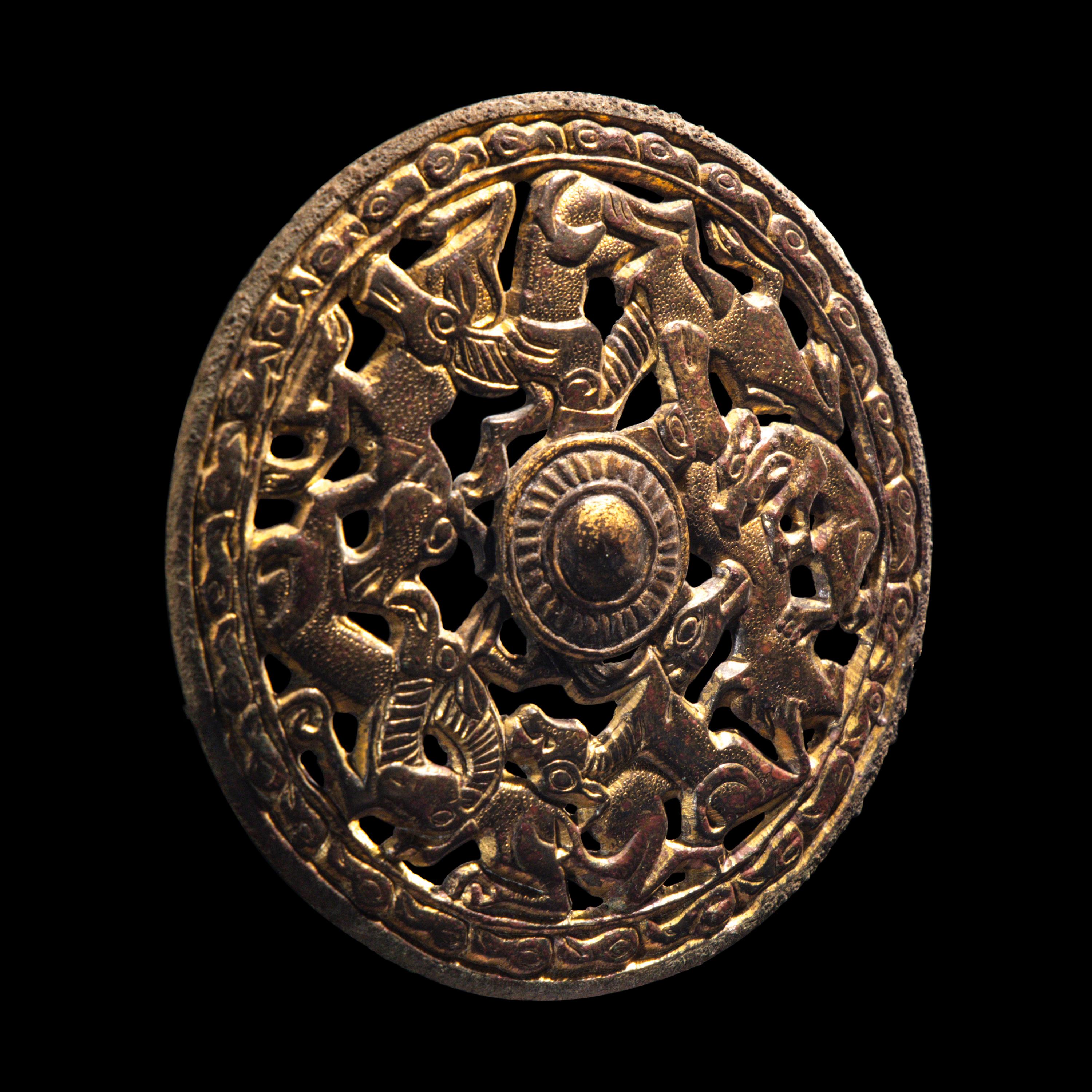 A Eurasian Gilt-Bronze Openwork Roundel