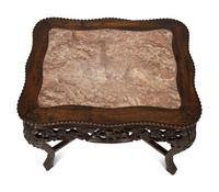 A Chinese Carved Hardwood Low Table with Marble Inset Top