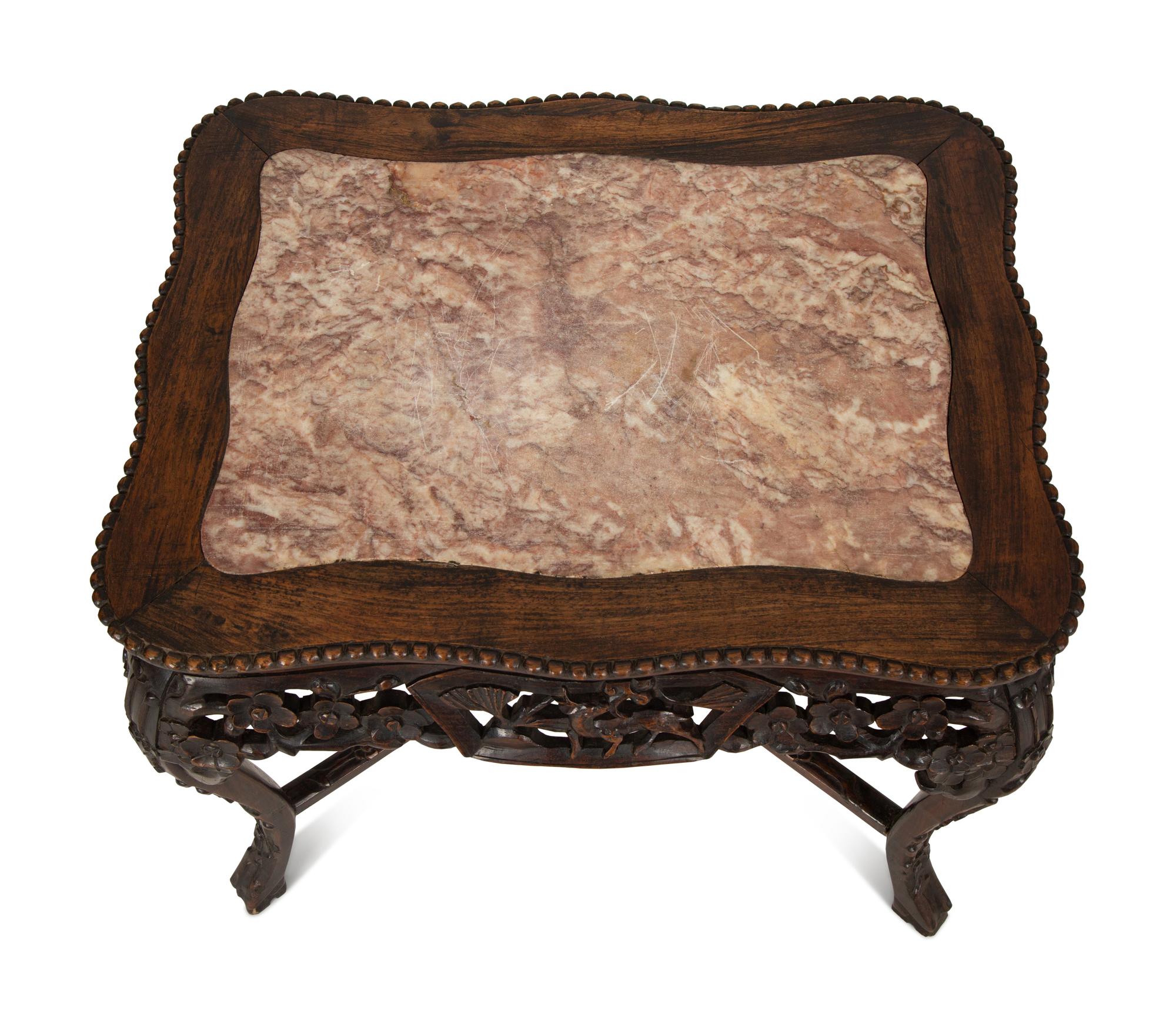 A Chinese Carved Hardwood Low Table with Marble Inset Top