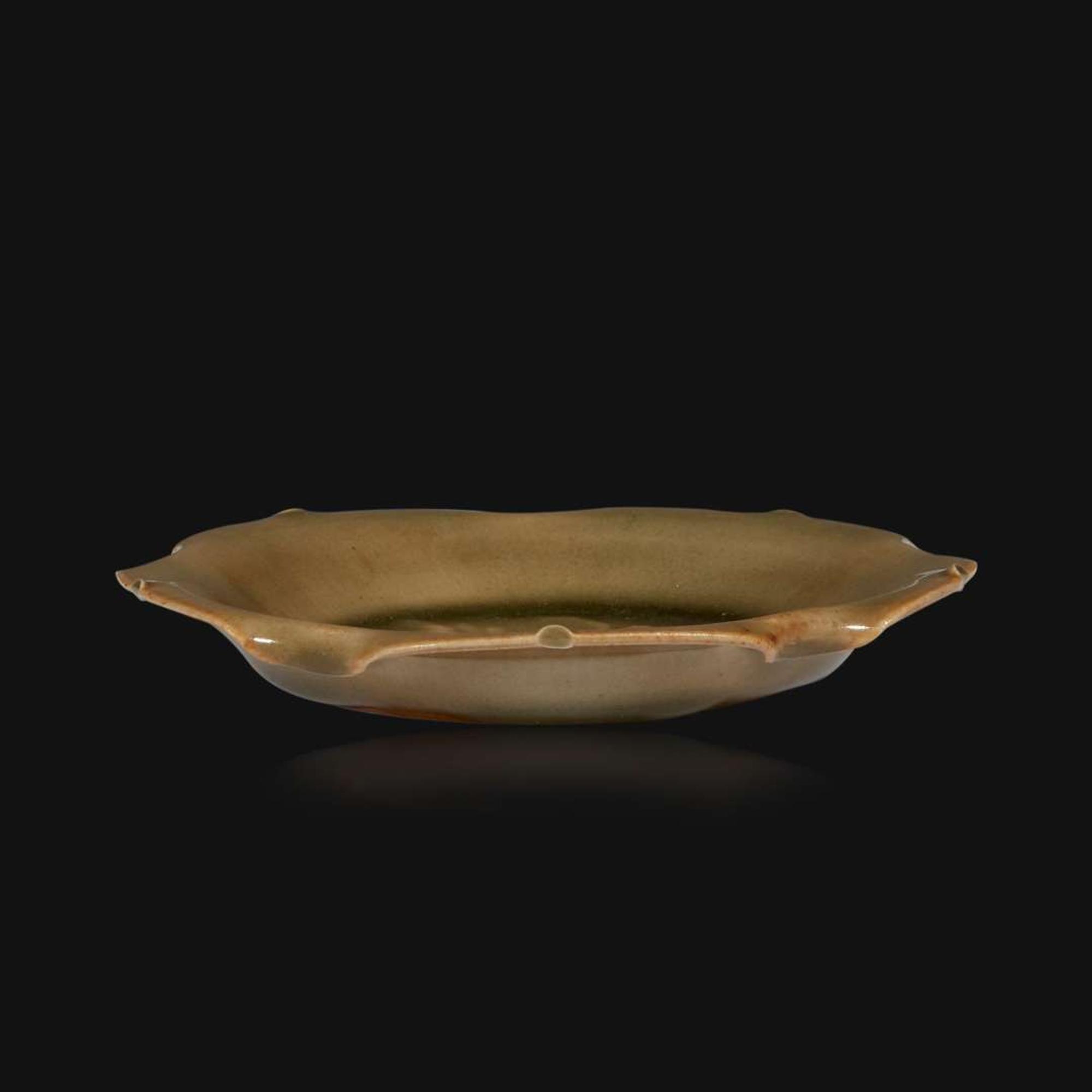 A small Yaozhou molded and carved lobed celadon dish Northern Song Dynasty