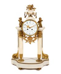 A Louis XVI Style Gilt Bronze Mounted Marble Mantel Clock
