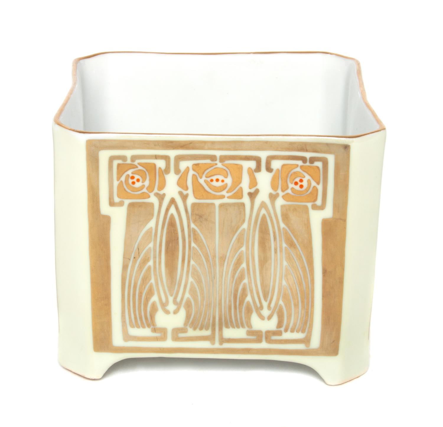 An Austrian Porcelain Cache Pot Height 4 1/4 x width 5 x depth 5 inches.
