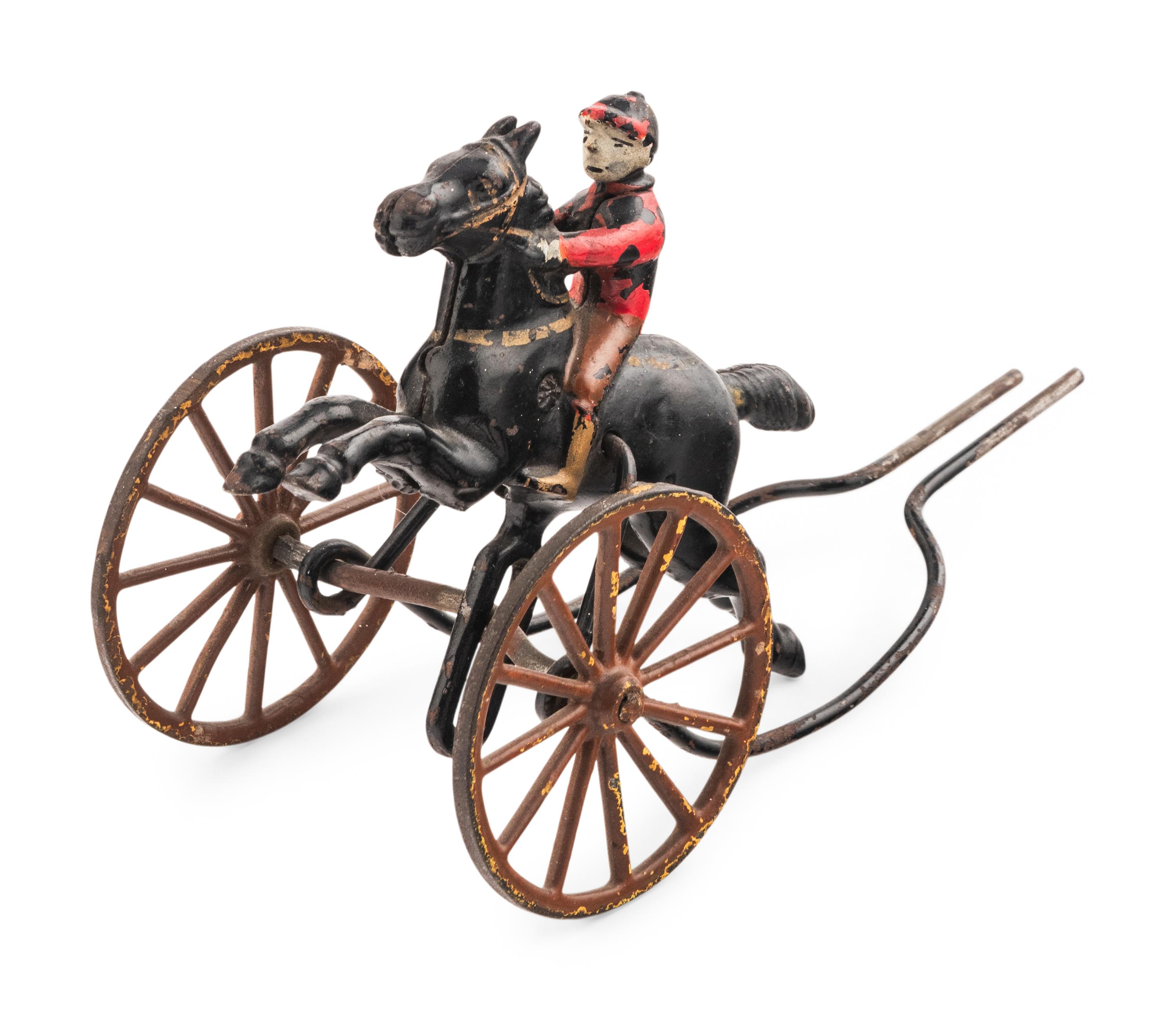 Two Cast Iron Pull Toys