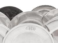 A Collection of American Silver Bread Plates