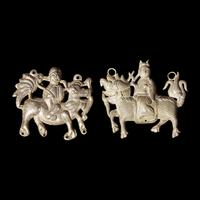 Eight Chinese Silver 'Boy and Qilin' Pendants, Late Qing Dynasty-Republic Period 晚清-民國 銀鍍金、銀燒藍及銀製麒麟送子長命鎖一組八件
