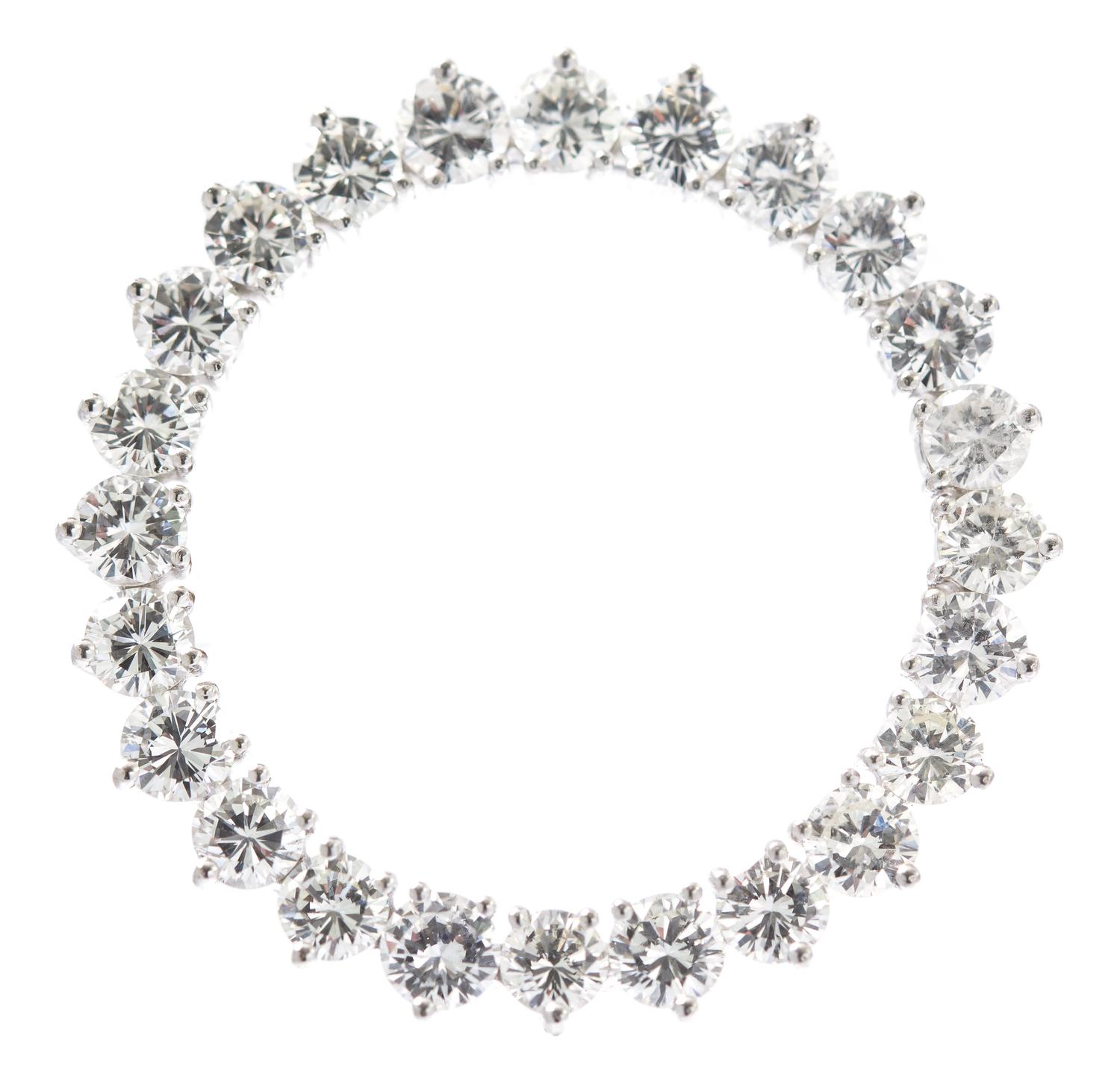 A Platinum and Diamond Circle Brooch, 6.80 dwts.