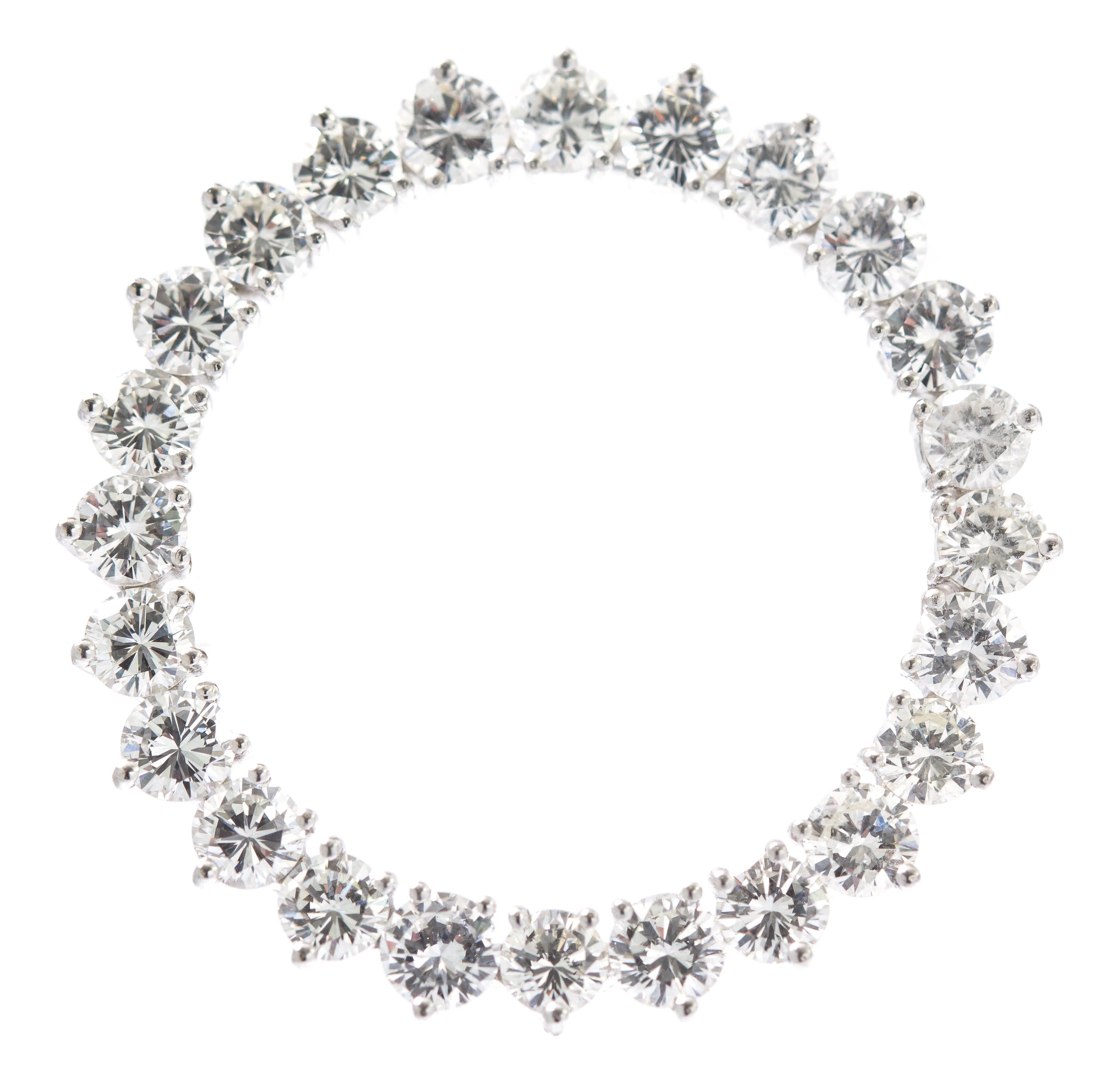 A Platinum and Diamond Circle Brooch, 6.80 dwts.