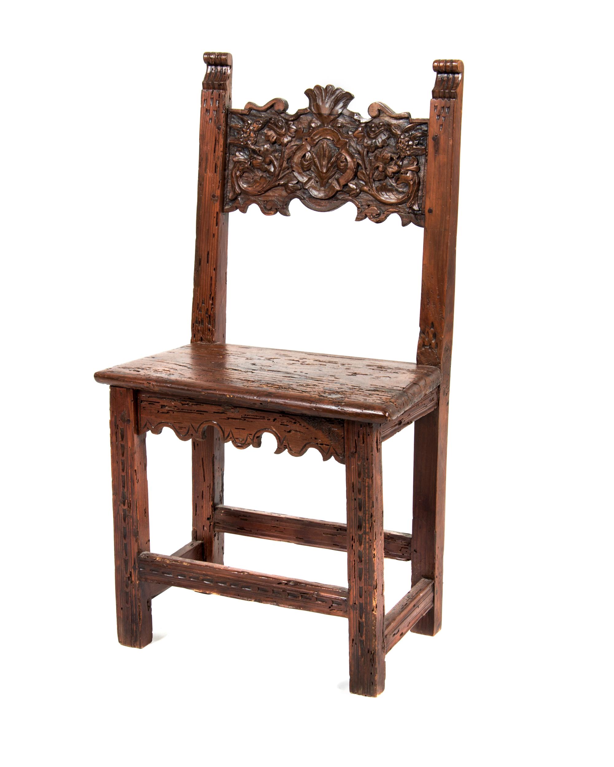 A Spanish Baroque Walnut Hall Chair Height 37 inches.