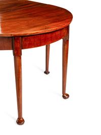 A Queen Anne Style Mahogany Oval Dining Table
