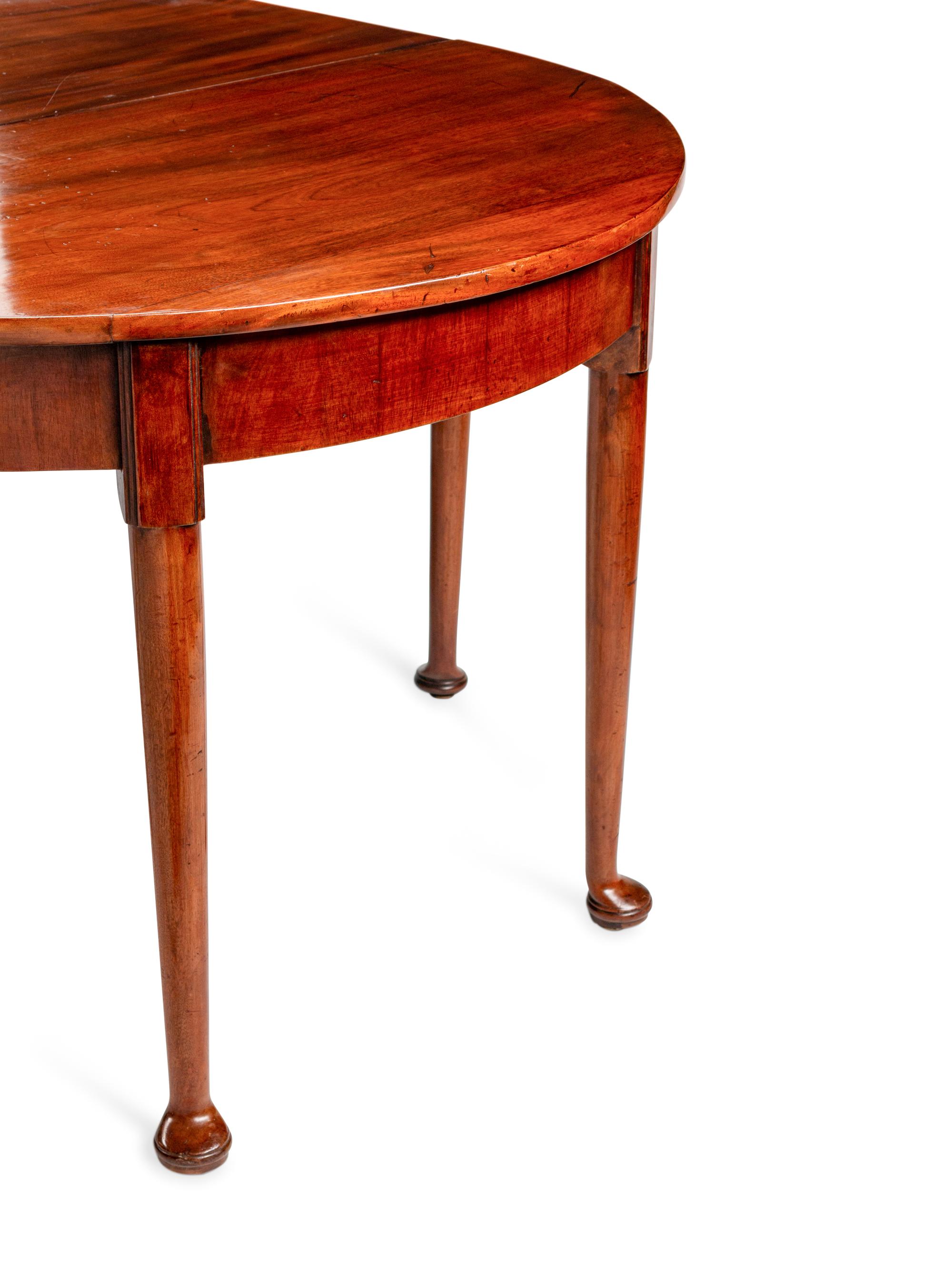 A Queen Anne Style Mahogany Oval Dining Table