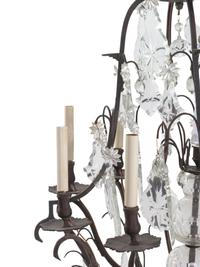 A Continental Cast Metal and Cut Glass Eight-Light Chandelier