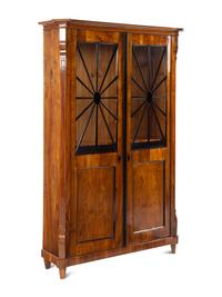 A Biedermeier Part-Ebonized Figured Walnut Bookcase