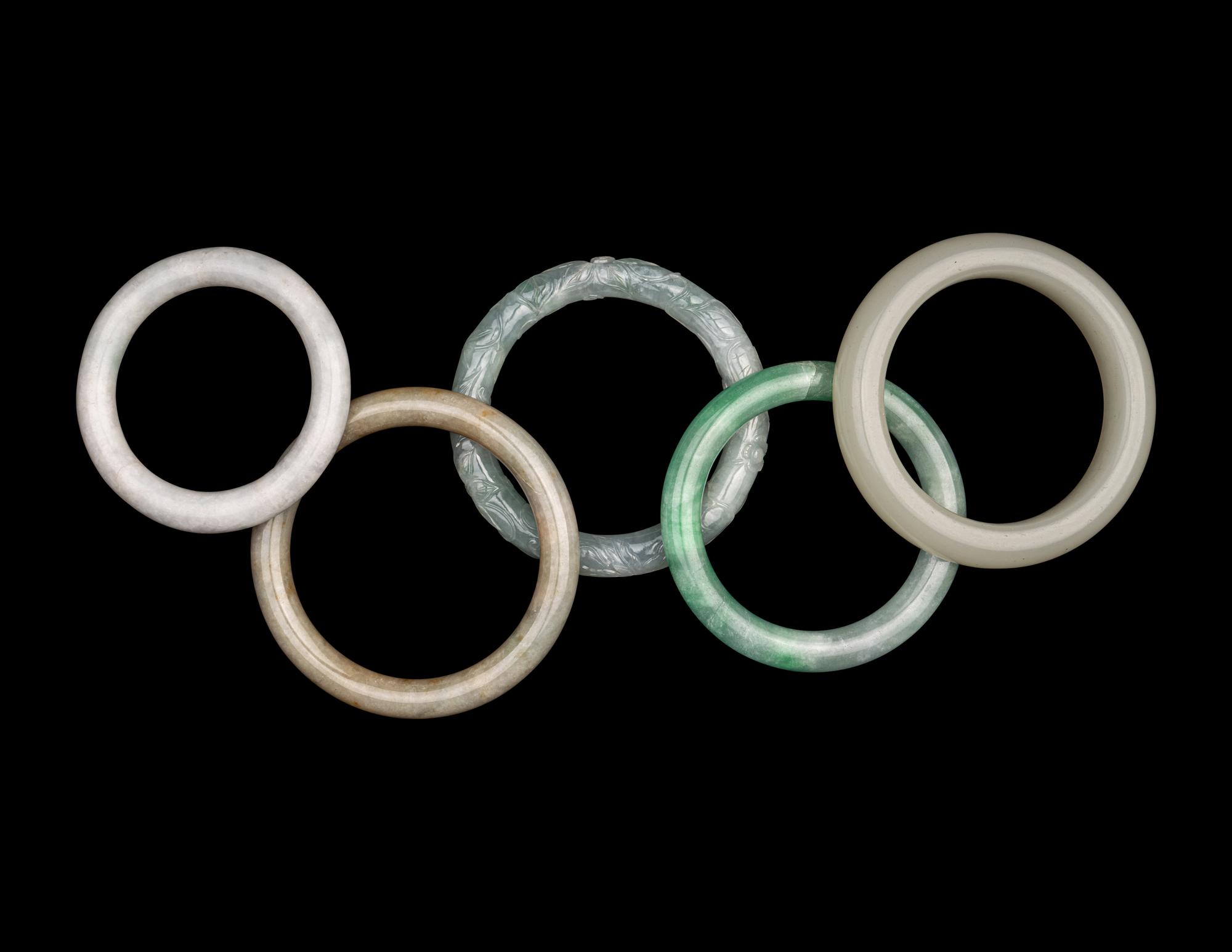 Five Chinese Jadeite and Glass Bracelets