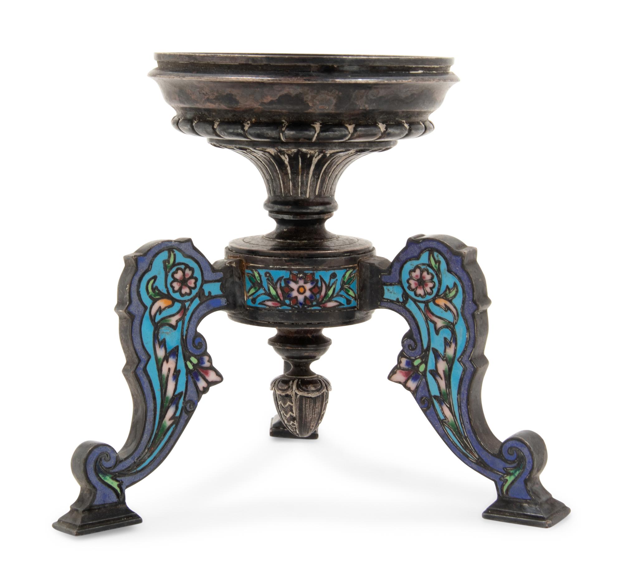 A Continental Silvered Metal and Enamel Tripod Stand
