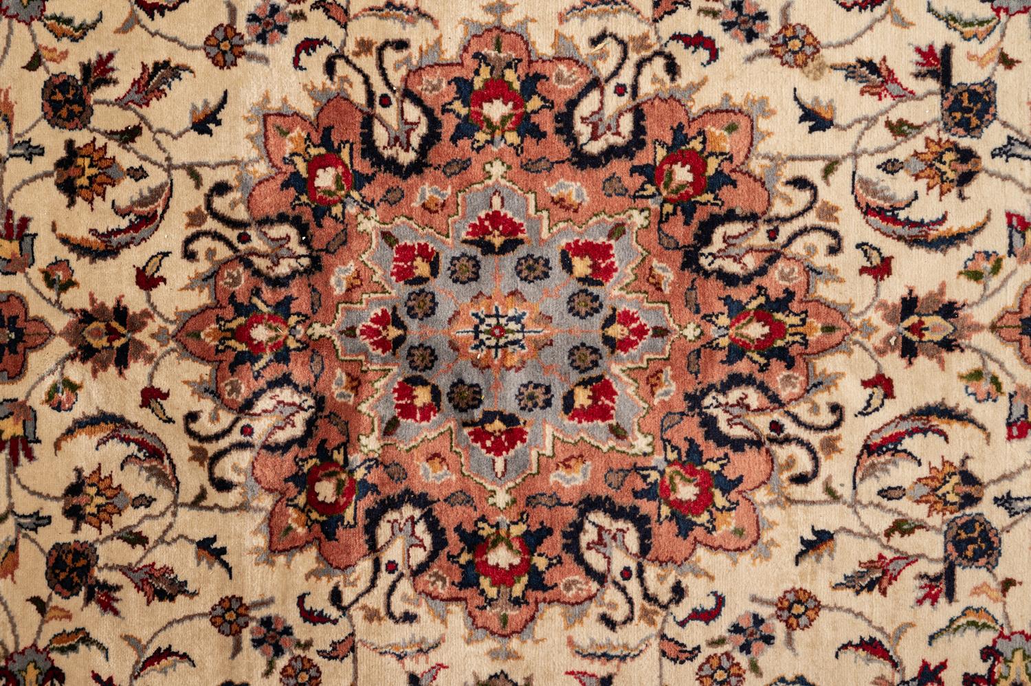 A Tabriz Wool Rug