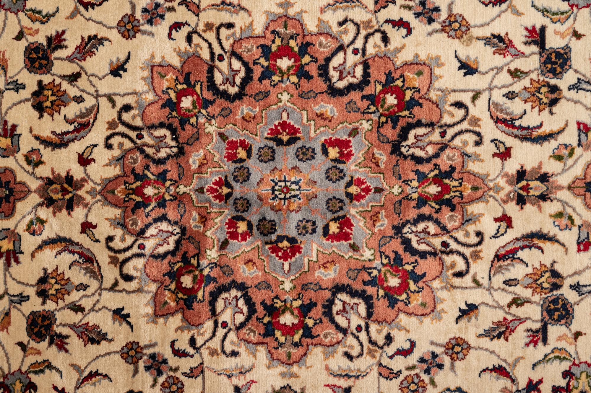 A Tabriz Wool Rug