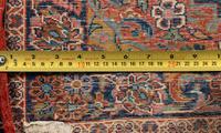 A Group of Three Wool Rugs