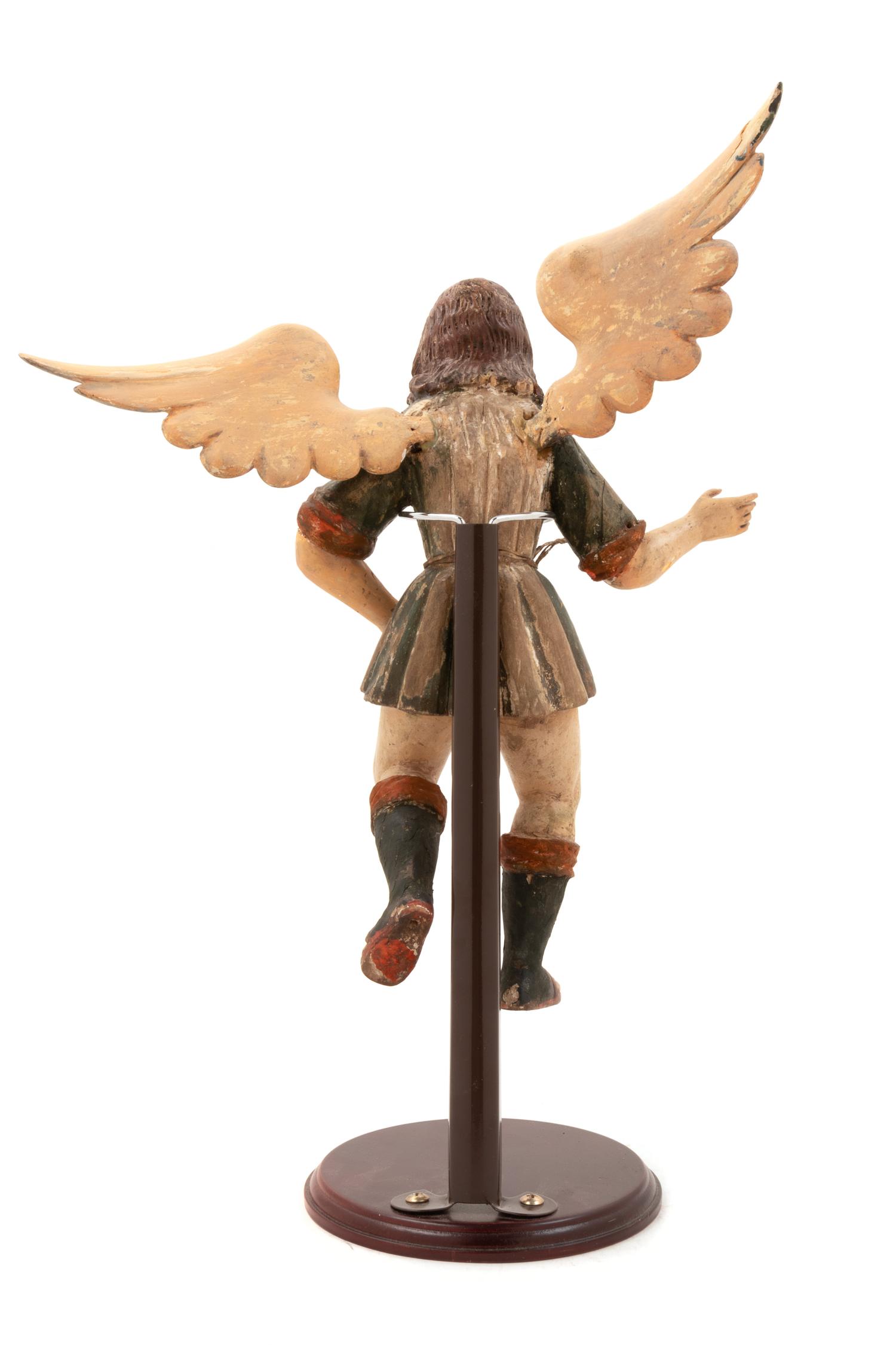 A Continental Carved Polychrome Figure