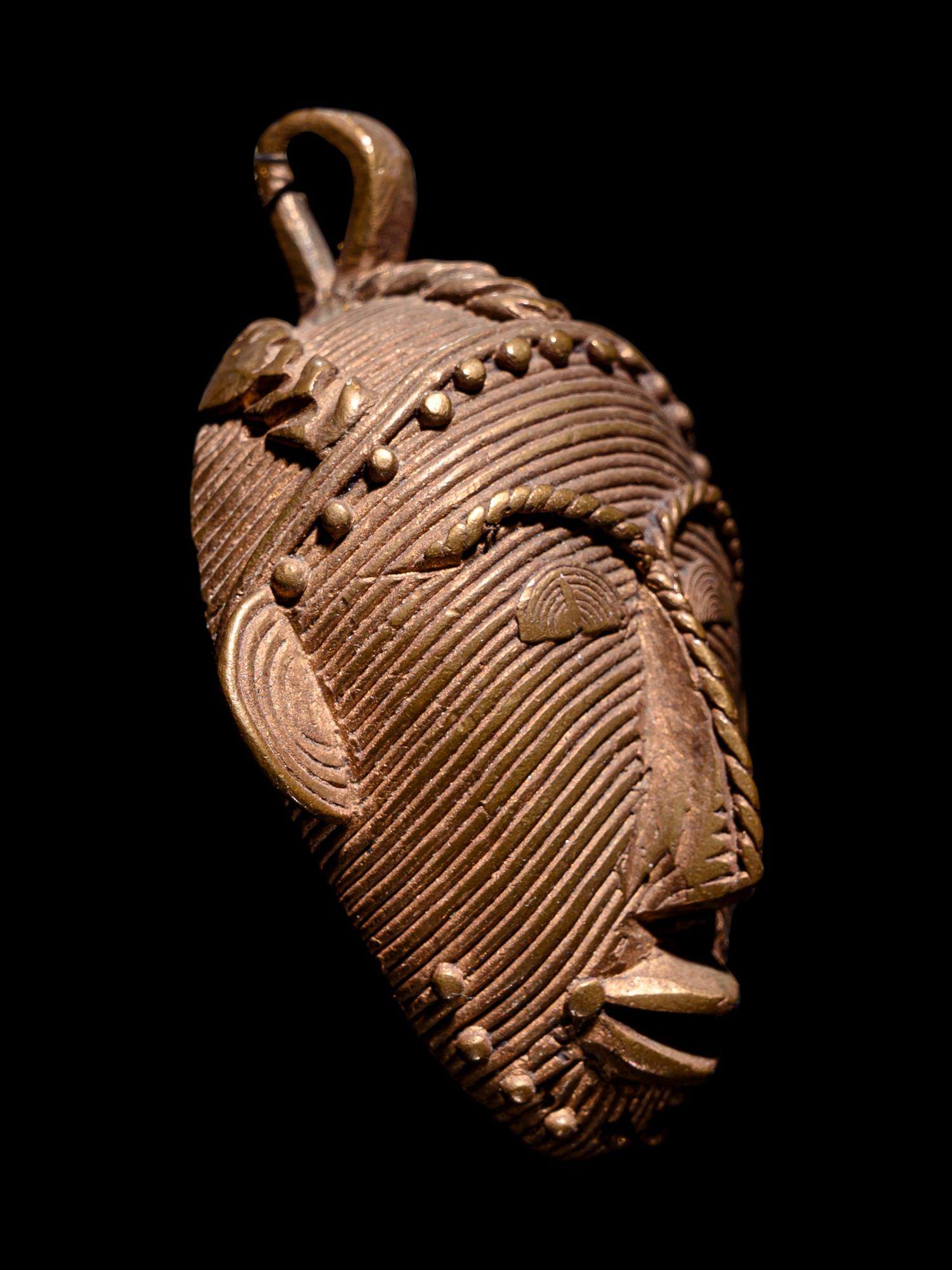 A Baule or Akan Gilt-Metal Pendant