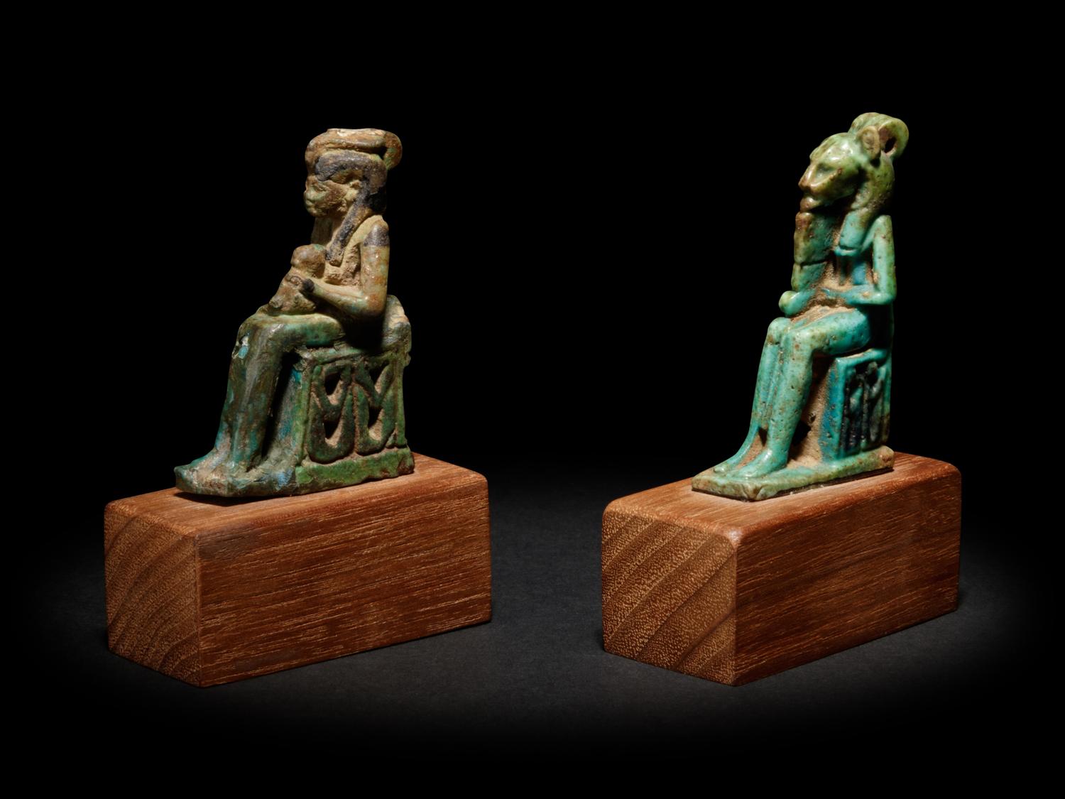 An Egyptian Faience Isis and Horus and an Egyptian Faience Sekhmet