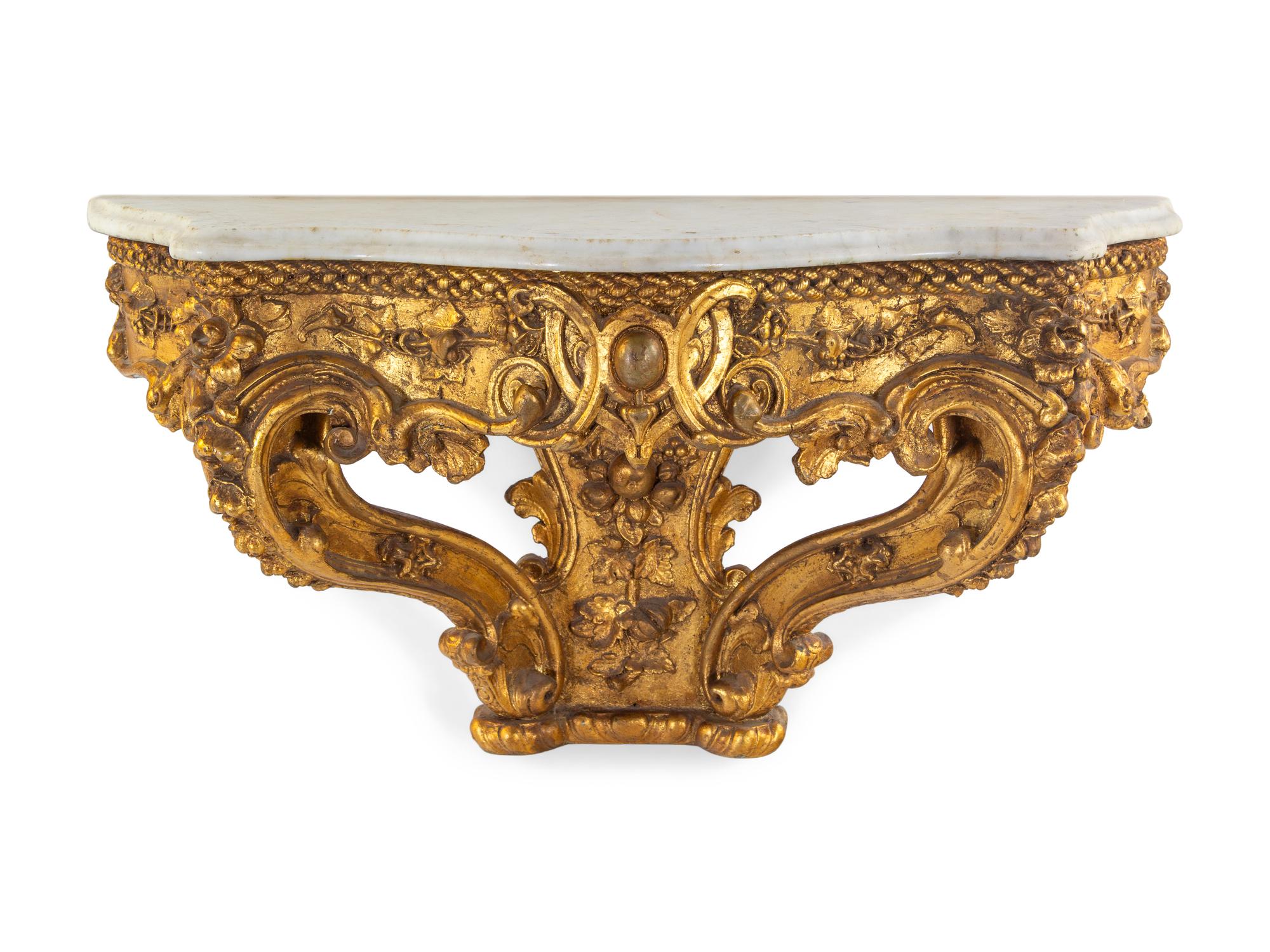 An Italian Rococo Carved Giltwood Marble Top Console d'Appliqué
