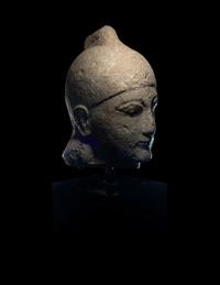 A Cypriot Limestone Head of a Male Votary