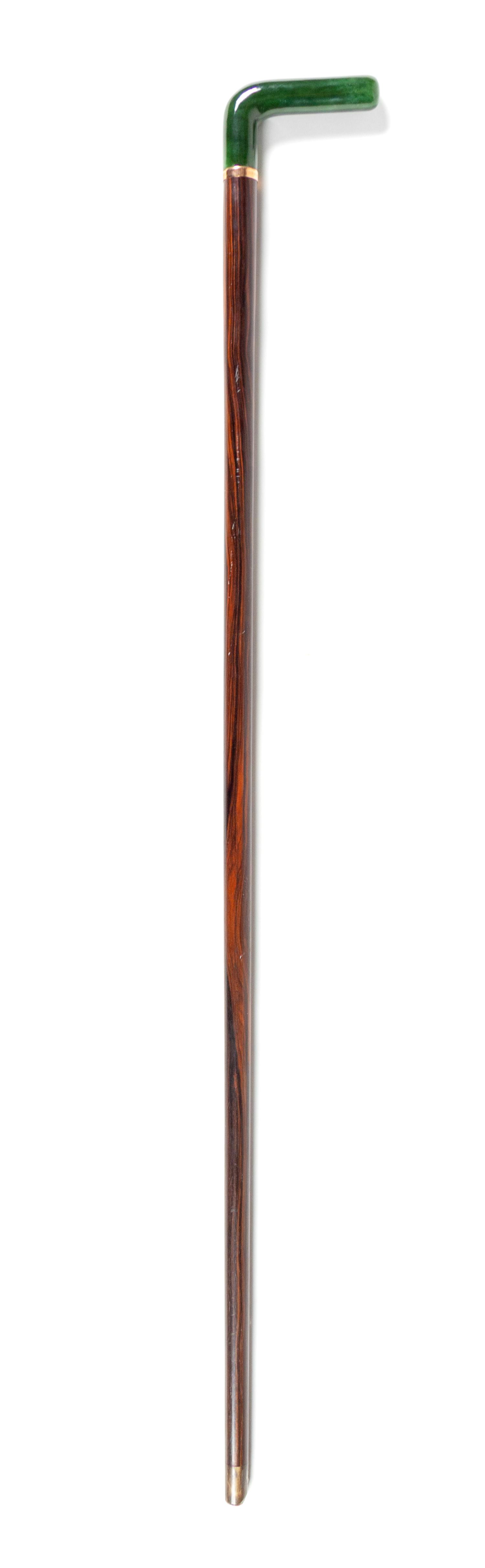 An English 9-Karat and Hardstone Mounted Cane Length 37 1/2 inches. — MAKER'S MARK BJ, LONDON, 1927