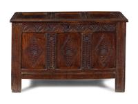 A Charles II Carved Oak Blanket Chest