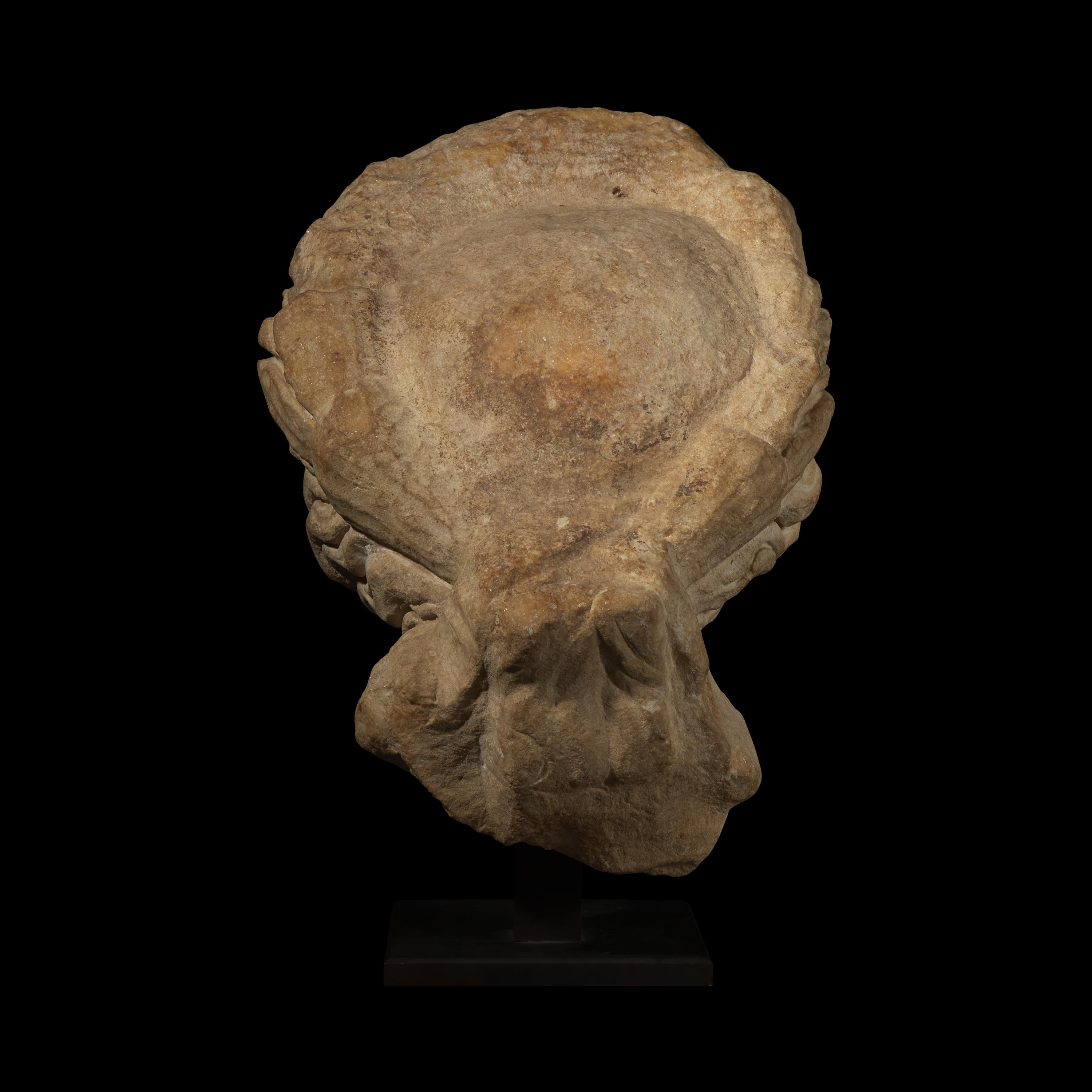 A Roman Marble Head of Apollo Citharoedus