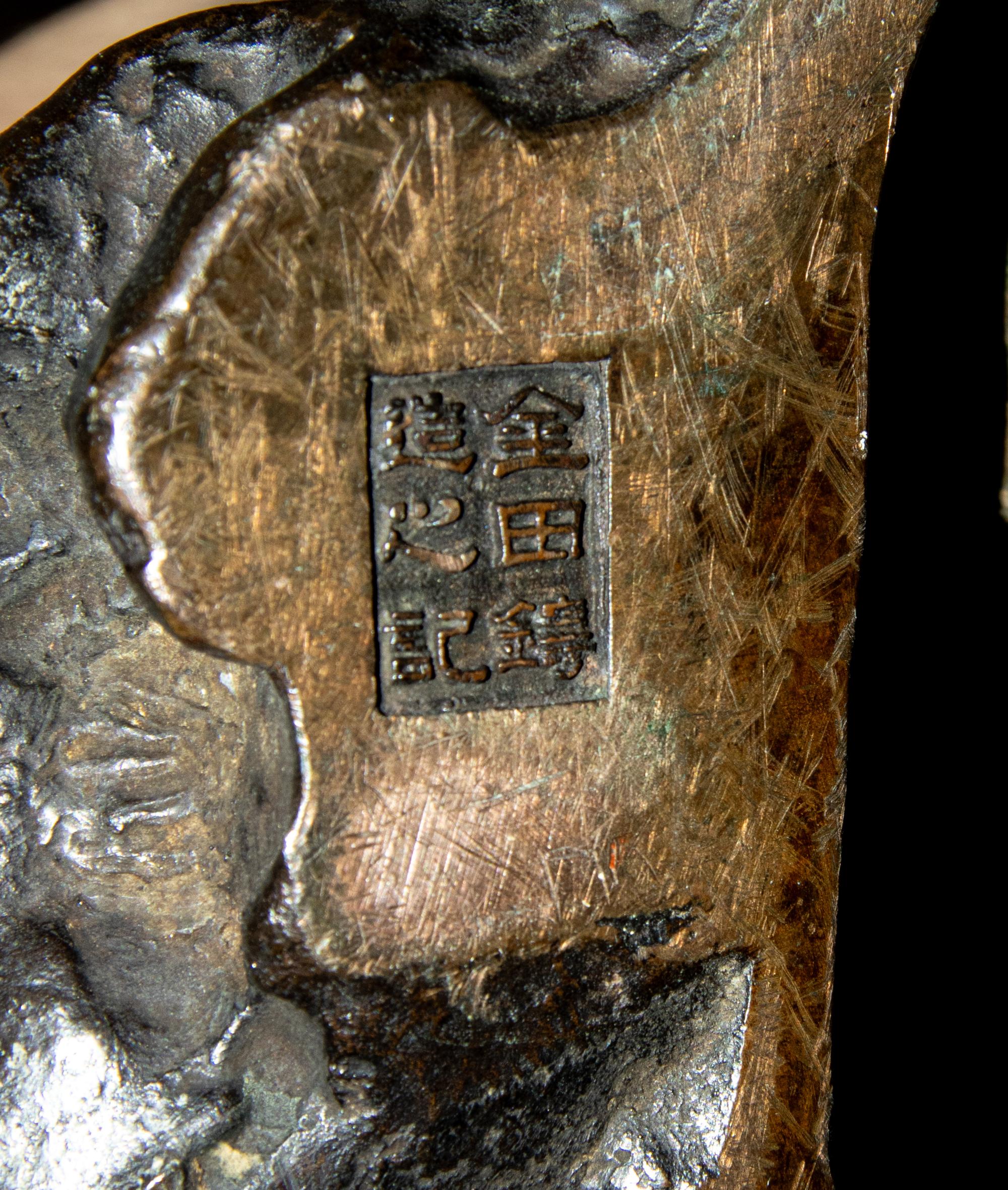 A Japanese Bronze Figure of an Elderly Man