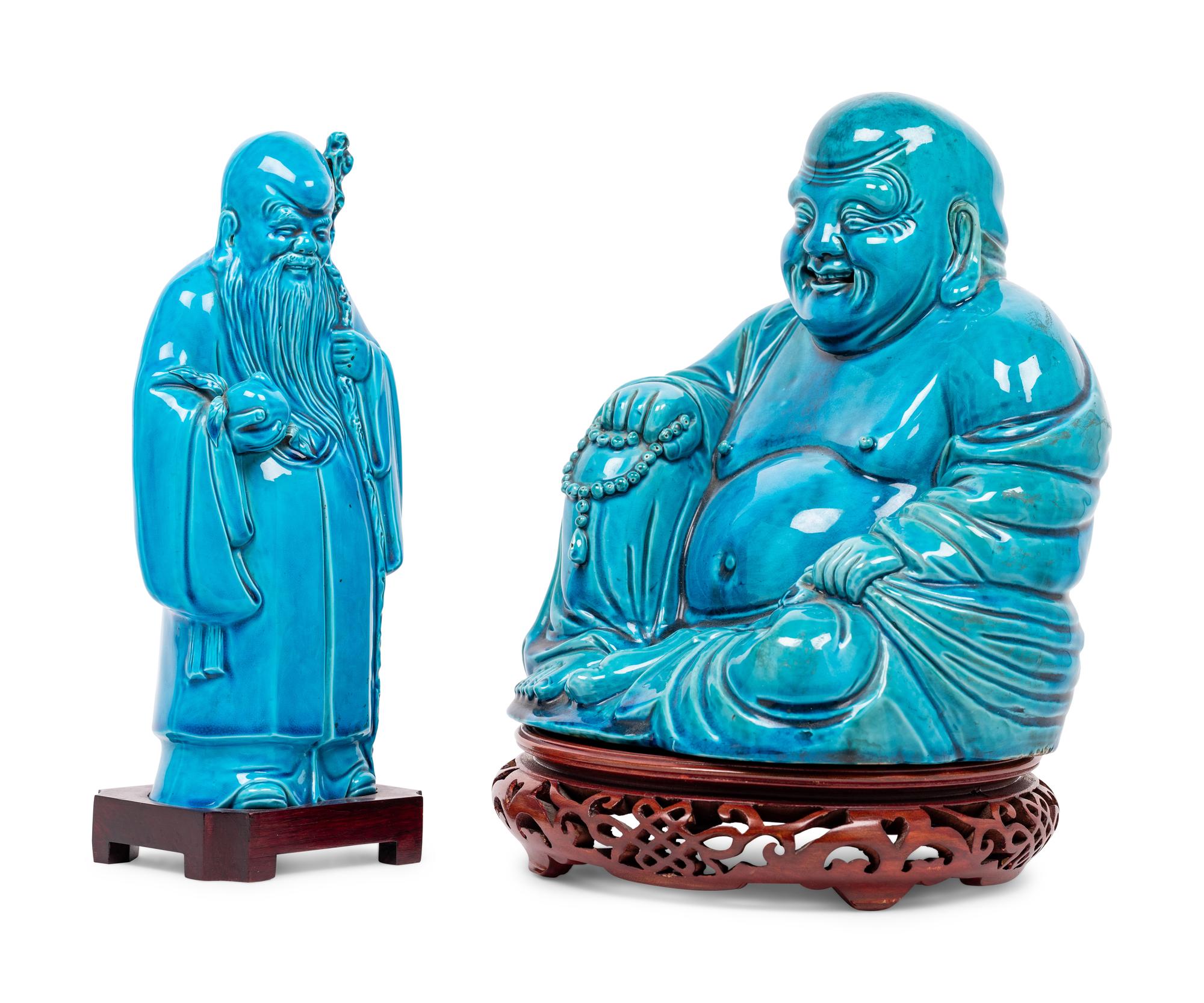 Two Turquoise Glazed Porcelain Figures of Immortals