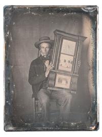 [EARLY PHOTOGRAPHY]. Quarter plate daguerreotype of a young man holding a clock.