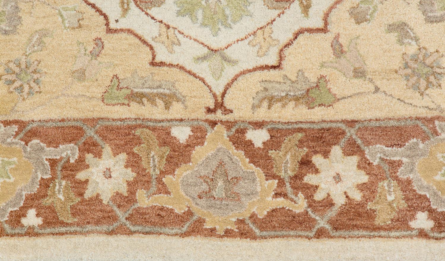 An Agra Wool Rug — 20TH CENTURY
