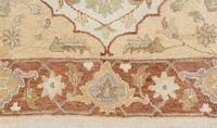 An Agra Wool Rug — 20TH CENTURY