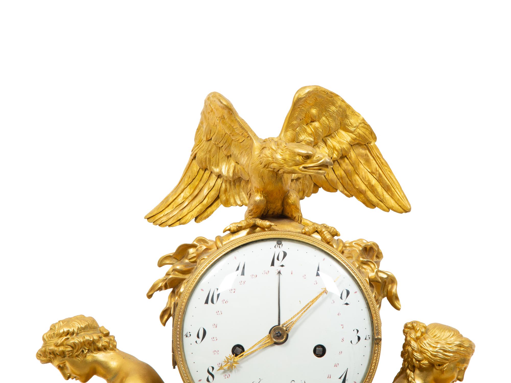 A Late Louis XVI Gilt Bronze and Marble Mantel Clock